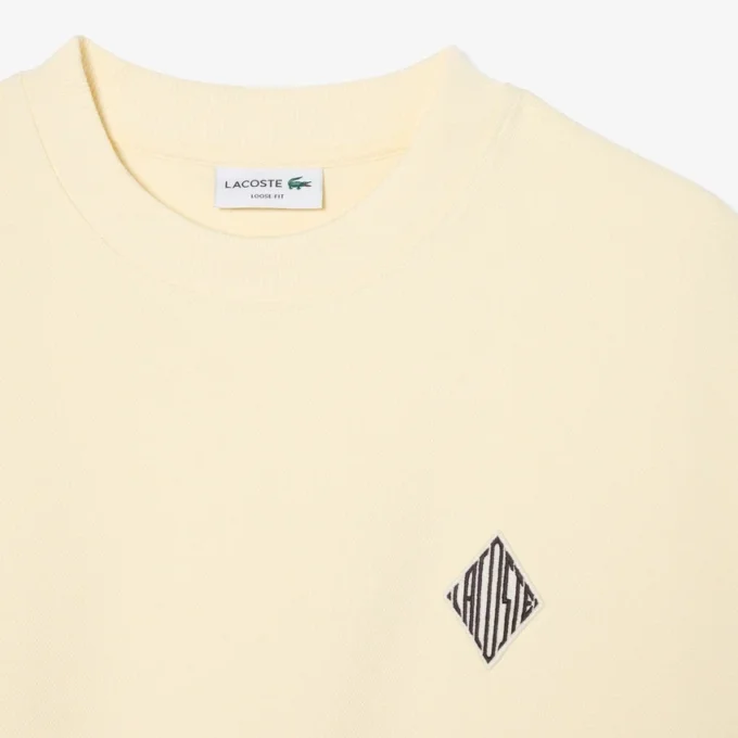 Bluza z podwójnym nadrukiem i naszywką Bluza z podwójnym nadrukiem i naszywką
