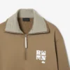 Bluza z wysokim kołnierzem, zamkiem błyskawicznym i naszywką z motywem z wybiegu