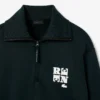 Bluza z wysokim kołnierzem, zamkiem błyskawicznym i naszywką z motywem z wybiegu Bluza z wysokim kołnierzem, zamkiem błyskawicznym i naszywką z motywem z wybiegu