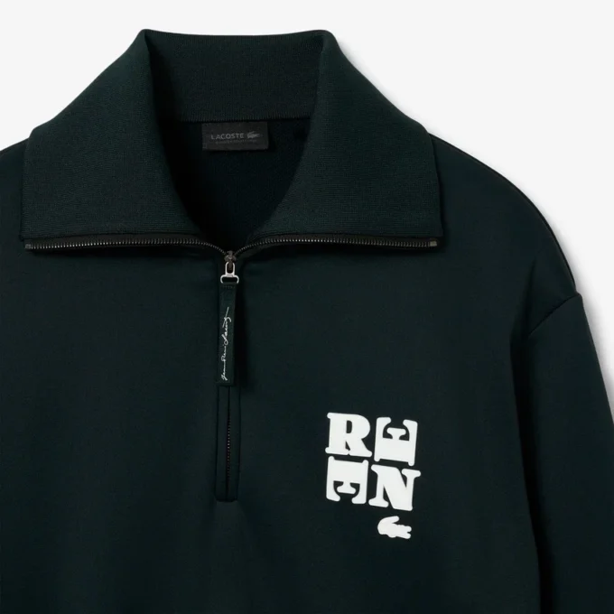 Bluza z wysokim kołnierzem, zamkiem błyskawicznym i naszywką z motywem z wybiegu Bluza z wysokim kołnierzem, zamkiem błyskawicznym i naszywką z motywem z wybiegu