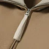 Bluza z wysokim kołnierzem, zamkiem błyskawicznym i naszywką z motywem z wybiegu