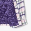 Damską oversize’ową pikowaną wełnianą koszulę Damską oversize’ową pikowaną wełnianą koszulę