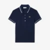 Damska koszulka Polo L.12.12 o dopasowanym kroju z wykończeniami Damska koszulka Polo L.12.12 o dopasowanym kroju z wykończeniami