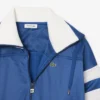 Damska oversizowa satynowa bluza w paski typu pointelle Damska oversizowa satynowa bluza w paski typu pointelle