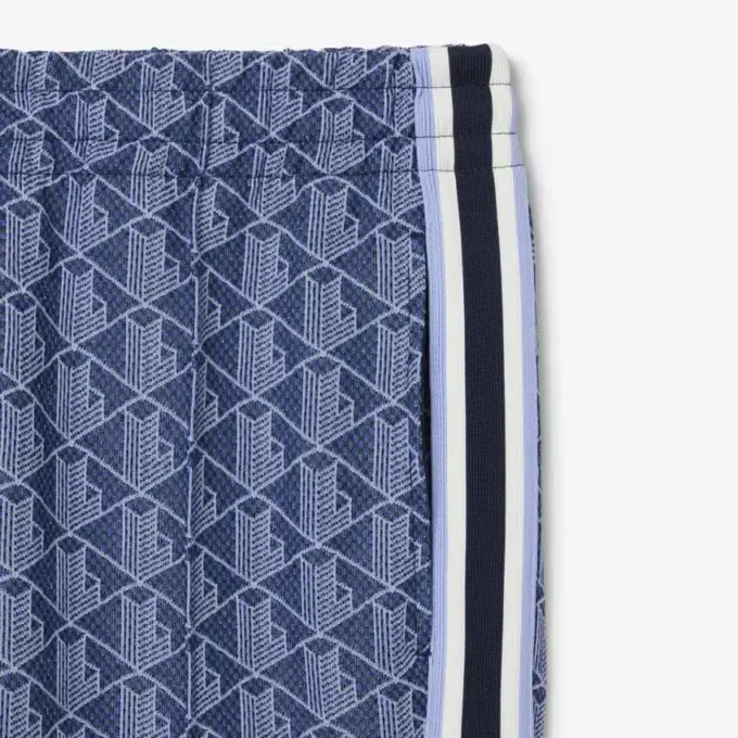 Damska spodnie dresowe z rozkloszowanymi nogawkami i monogramem Damska spodnie dresowe z rozkloszowanymi nogawkami i monogramem