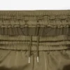 Damskie oversize’owe satynowe spodnie dresowe Damskie oversize’owe satynowe spodnie dresowe