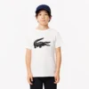 Dziecięcy T-shirt tenisowy z bawełny technicznej w stylu oversize Dziecięcy T-shirt tenisowy z bawełny technicznej w stylu oversize