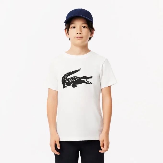 Dziecięcy T-shirt tenisowy z bawełny technicznej w stylu oversize Dziecięcy T-shirt tenisowy z bawełny technicznej w stylu oversize