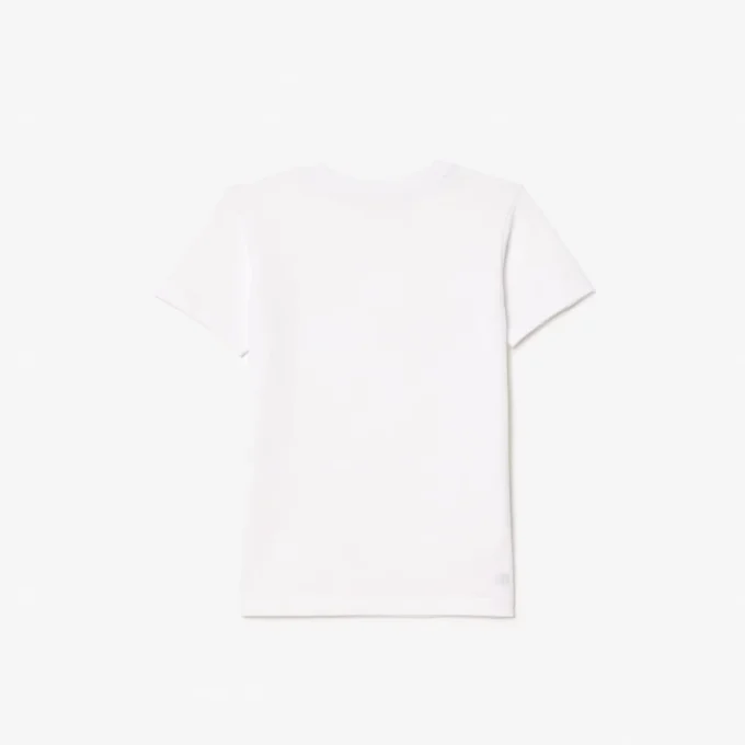 Dziecięcy T-shirt tenisowy z bawełny technicznej w stylu oversize Dziecięcy T-shirt tenisowy z bawełny technicznej w stylu oversize