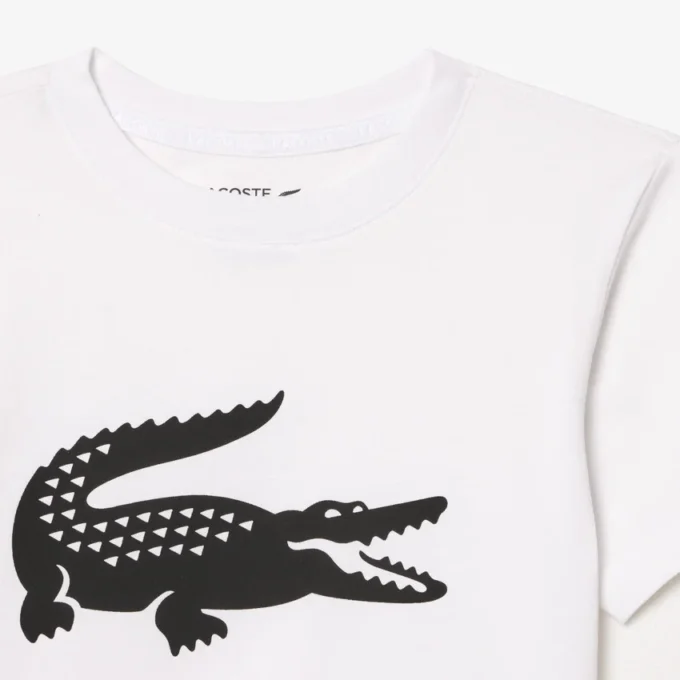 Dziecięcy T-shirt tenisowy z bawełny technicznej w stylu oversize Dziecięcy T-shirt tenisowy z bawełny technicznej w stylu oversize