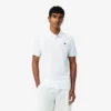 Koszulka polo Lacoste Tennis X Novak Djokovic na kort Koszulka polo Lacoste Tennis X Novak Djokovic na kort