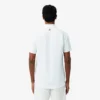 Koszulka polo Lacoste Tennis X Novak Djokovic na kort Koszulka polo Lacoste Tennis X Novak Djokovic na kort