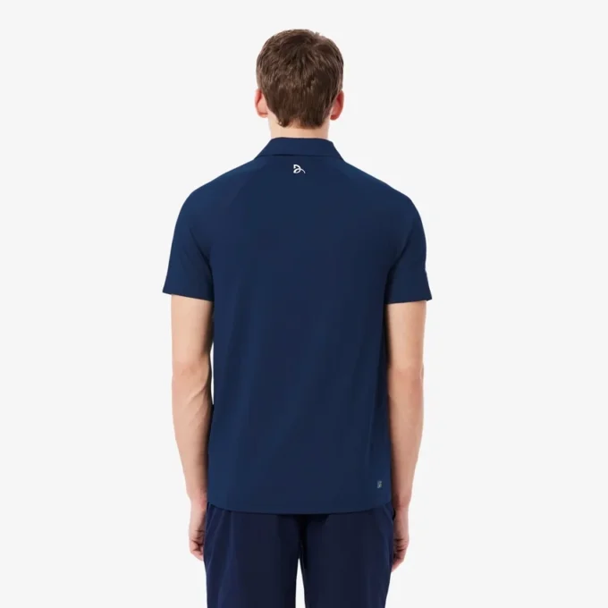 Koszulka polo Lacoste Tennis X Novak Djokovic na kort Koszulka polo Lacoste Tennis X Novak Djokovic na kort