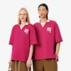 Koszulka Polo oversize z satyny z naszywką z wybiegu Koszulka Polo oversize z satyny z naszywką z wybiegu