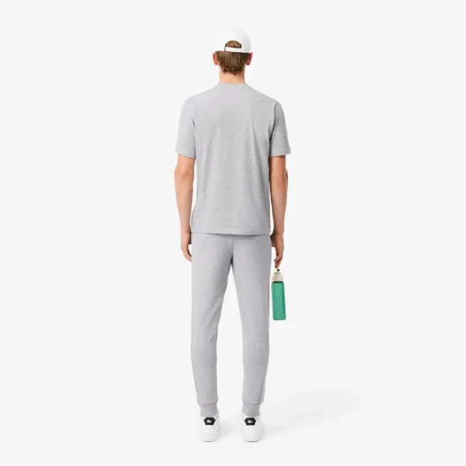 Męskie spodnie dresowe z dżerseju o kroju slim fit Męskie spodnie dresowe z dżerseju o kroju slim fit