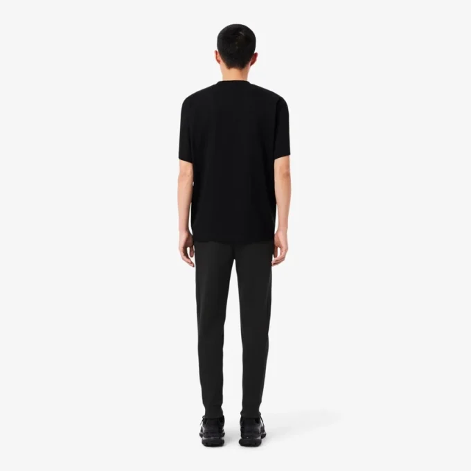 Męskie spodnie dresowe z dżerseju o kroju slim fit Męskie spodnie dresowe z dżerseju o kroju slim fit