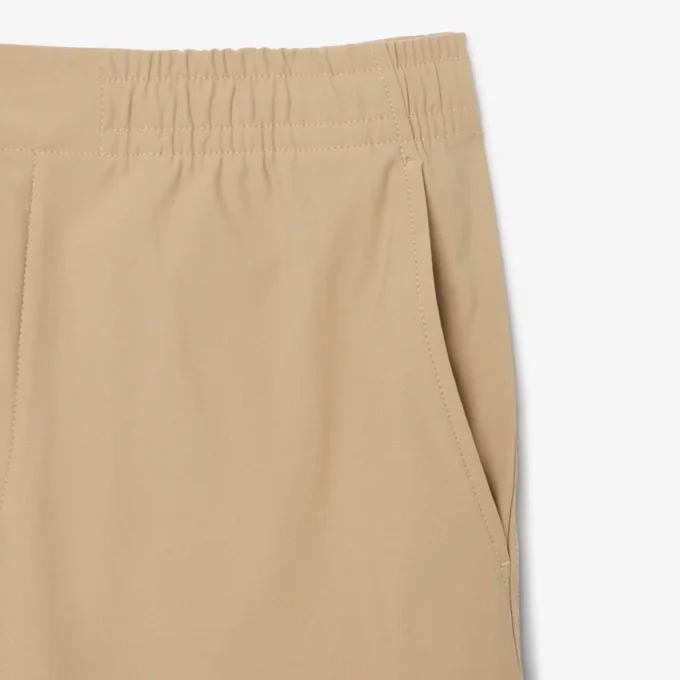 Spodnie chino o regularnym kroju z elastycznego materiału Spodnie chino o regularnym kroju z elastycznego materiału