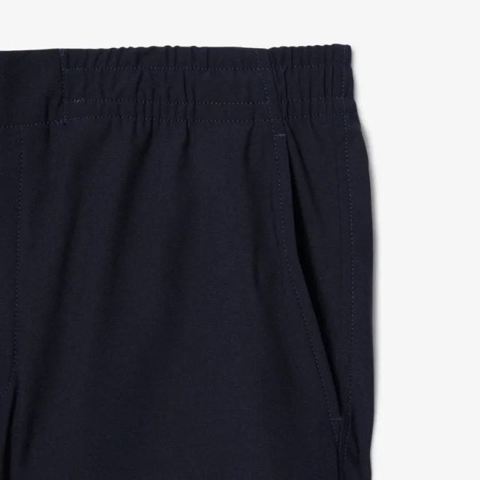 Spodnie chino o regularnym kroju z elastycznego materiału Spodnie chino o regularnym kroju z elastycznego materiału