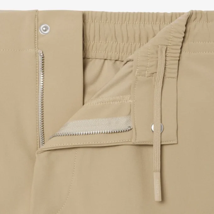 Spodnie chino o regularnym kroju z elastycznego materiału Spodnie chino o regularnym kroju z elastycznego materiału