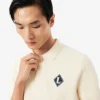 Sweter z kołnierzem Polo i naszywką „Made in France”