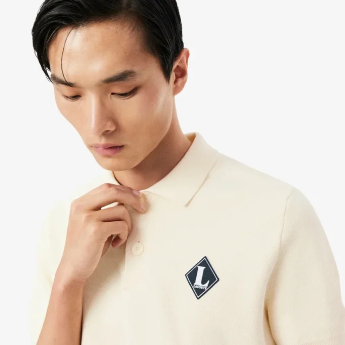 Sweter z kołnierzem Polo i naszywką „Made in France”