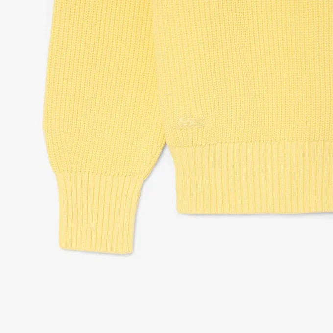 Sweter z naszywką z dzianiny ściągaczowej w kolorze perłowym
