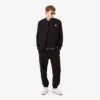 Sweter z naszywką z dzianiny w prążki