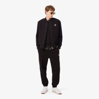 Sweter z naszywką z dzianiny w prążki Sweter z naszywką z dzianiny w prążki