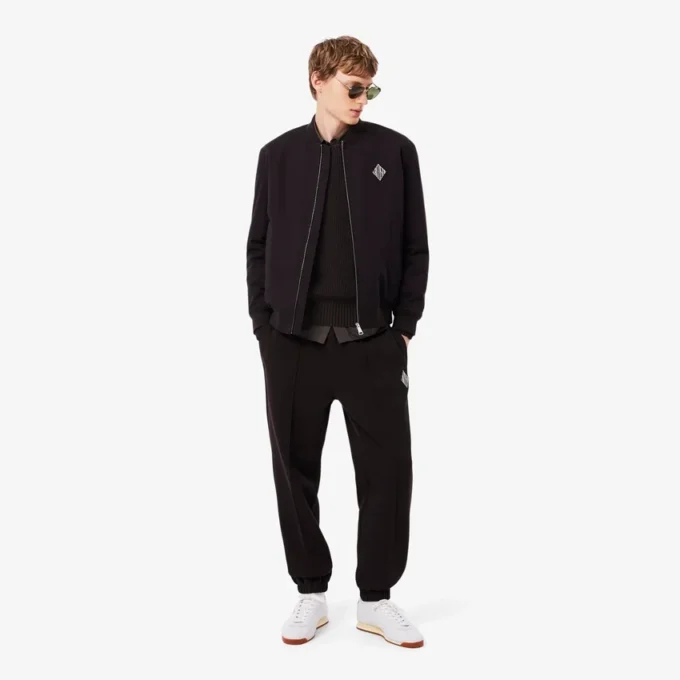 Sweter z naszywką z dzianiny w prążki