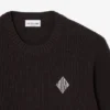 Sweter z naszywką z dzianiny w prążki