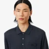 Sweter z wełny merynosowej z kołnierzem Polo z kolekcji Runway