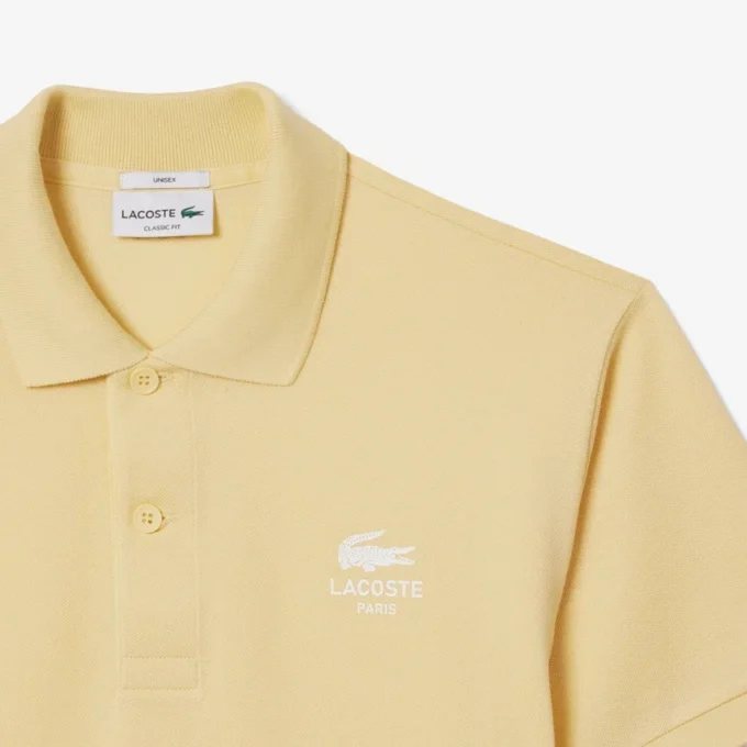 Unisexowa koszulka Polo L.12.12 o klasycznym kroju z charakterystycznym nadrukiem Unisexowa koszulka Polo L.12.12 o klasycznym kroju z charakterystycznym nadrukiem